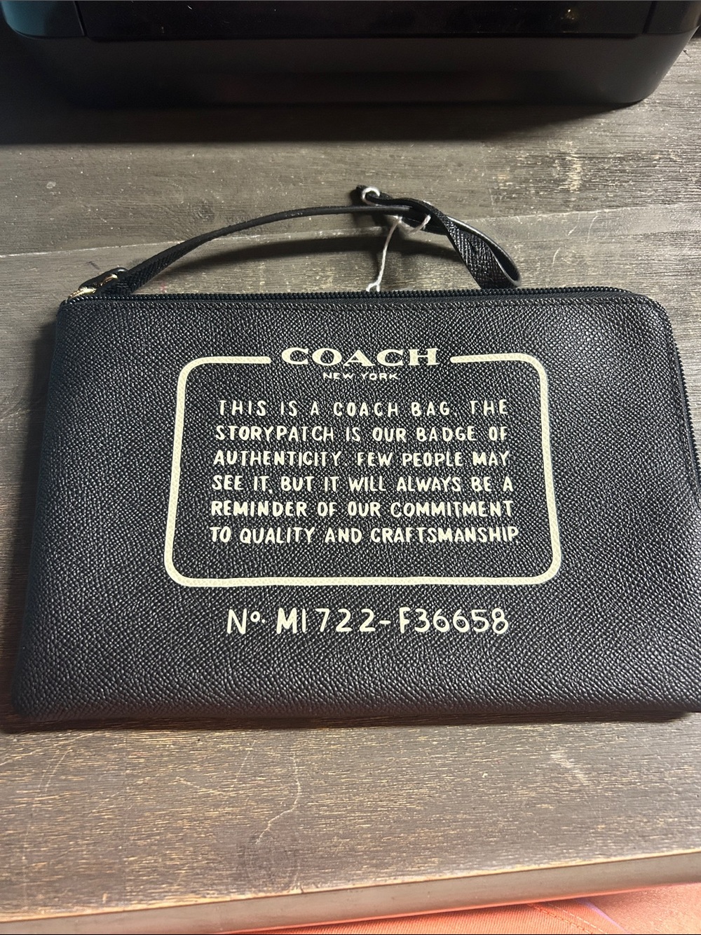 Coach Black Leather Wristlet Pouch with White‎ Story Patch Print